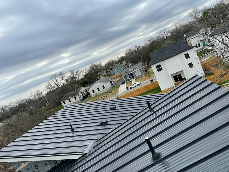 Standing seam metal roof panels with vents for Skylight Repair in Rockaway